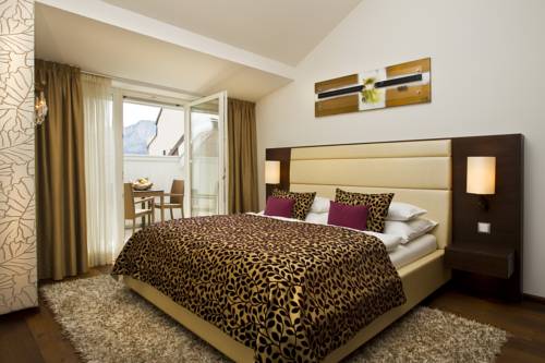 Imagen de la habitación del Hotel Iris Porsche and Restaurant. Foto 10