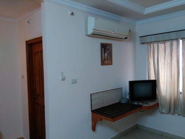 Imagen de la habitación del Hotel Iroomz Amrutha Residency. Foto 4