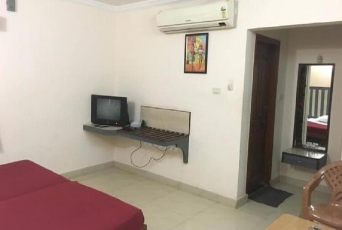Imagen de la habitación del Hotel Iroomz Amrutha Residency. Foto 9