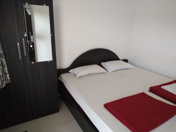 Imagen de la habitación del Hotel Iroomz Gananjaya - Hostel. Foto 12