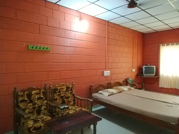 Imagen de la habitación del Hotel Iroomz Savitri Guest House. Foto 7