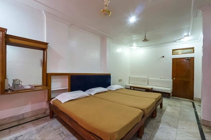 Imagen de la habitación del Hotel Iroomz Shanbhag Towers International. Foto 6