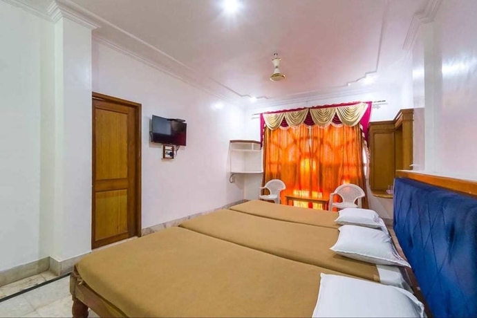 Imagen de la habitación del Hotel Iroomz Shanbhag Towers International. Foto 9