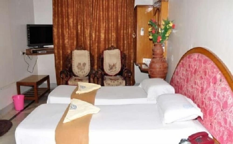Imagen de la habitación del Hotel Iroomz Shanbhag Towers International. Foto 11