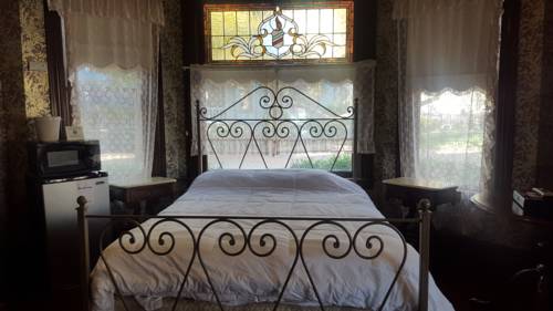 Imagen de la habitación del Hotel Irwin Street Inn. Foto 8