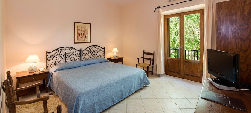 Imagen de la habitación del Hotel Is Morus Relais. Foto 5