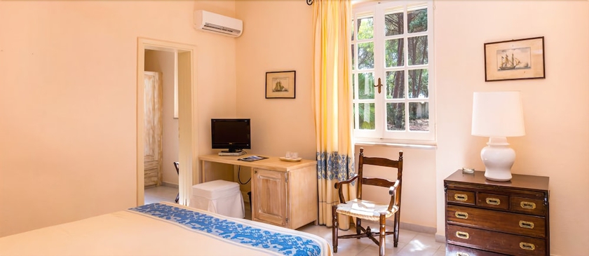 Imagen de la habitación del Hotel Is Morus Relais. Foto 7