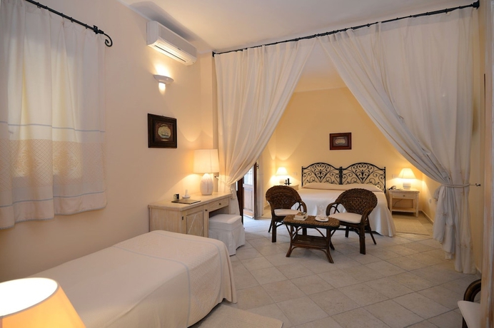 Imagen de la habitación del Hotel Is Morus Relais. Foto 8