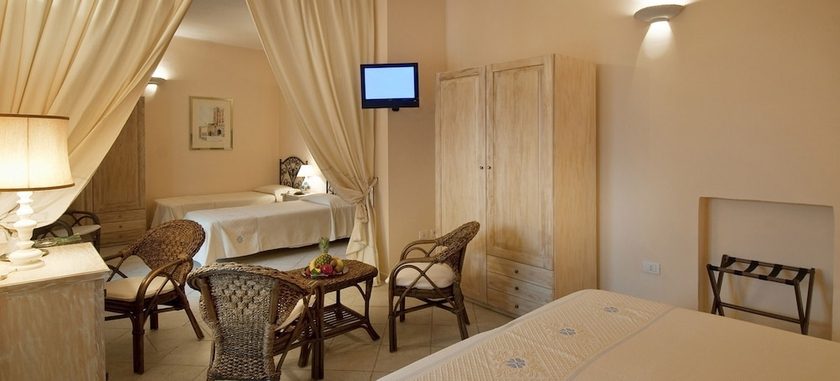 Imagen de la habitación del Hotel Is Morus Relais. Foto 16