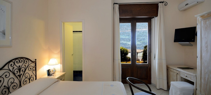 Imagen de la habitación del Hotel Is Morus Relais. Foto 19