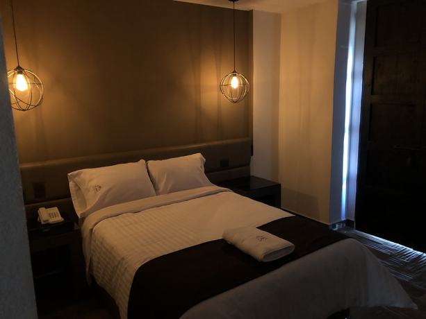 Imagen de la habitación del Hotel Isabel, Centro Hist&oacute;rico de Puebla. Foto 5