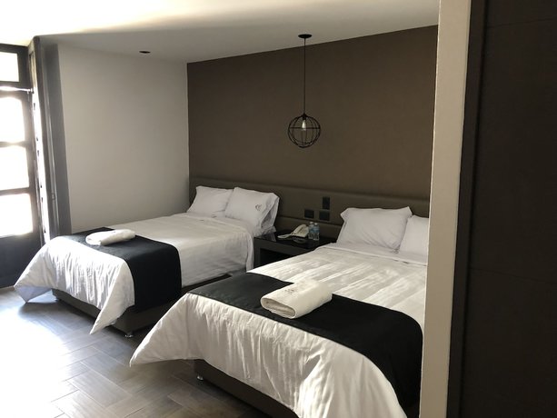 Imagen de la habitación del Hotel Isabel, Centro Hist&oacute;rico de Puebla. Foto 9