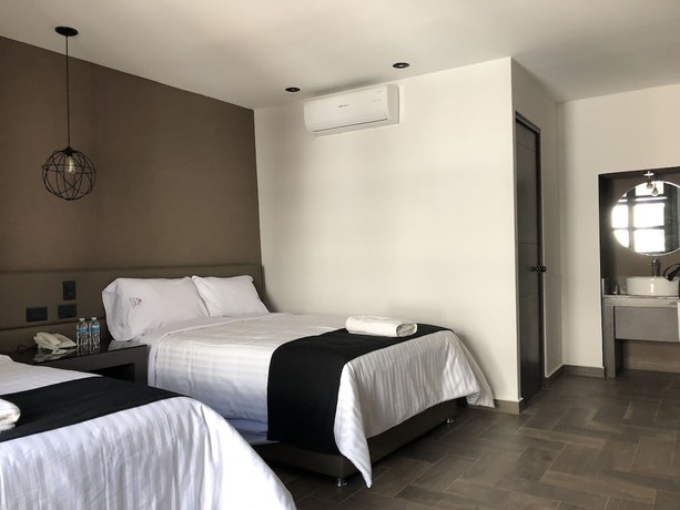 Imagen de la habitación del Hotel Isabel, Centro Hist&oacute;rico de Puebla. Foto 14