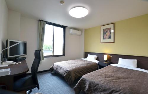 Imagen de la habitación del Hotel Isahaya Daiichi. Foto 3