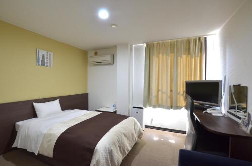 Imagen de la habitación del Hotel Isahaya Daiichi. Foto 5