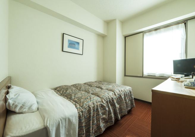 Imagen de la habitación del Hotel Isahaya Terminal. Foto 9