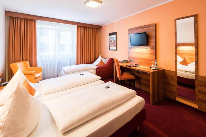 Imagen de la habitación del Hotel Isartor. Foto 6