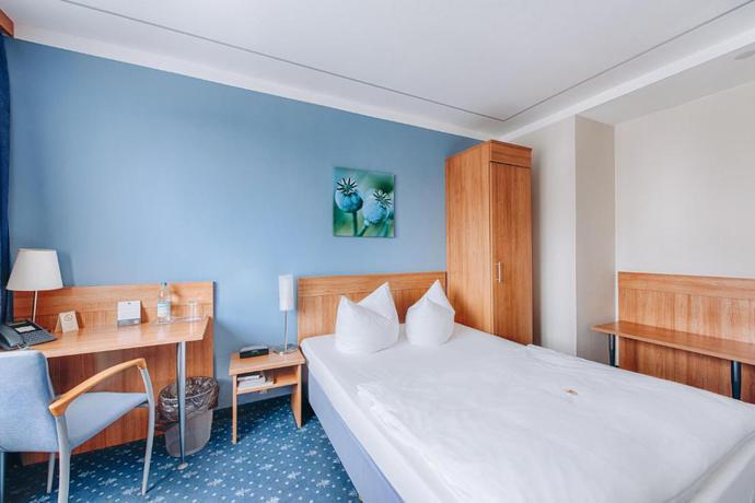 Imagen de la habitación del Hotel Isartor. Foto 7