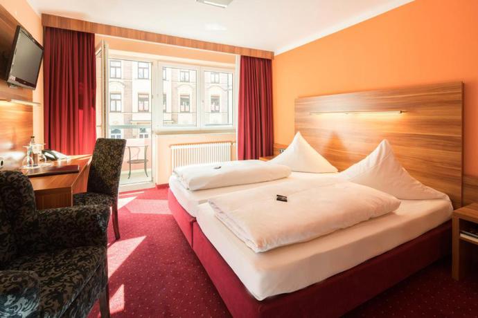 Imagen de la habitación del Hotel Isartor. Foto 10
