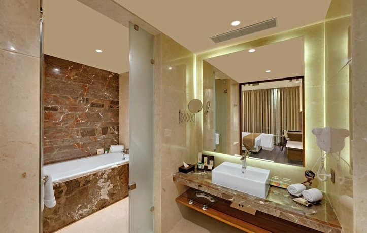 Imagen de la habitación del Hotel Iscon The Fern Resort and Spa, Bhavnagar. Foto 16