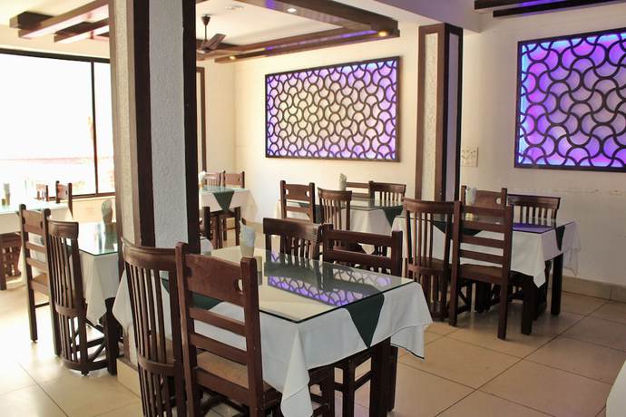 Imagen del bar/restaurante del Hotel Ishan A Riverside Retreat. Foto 3