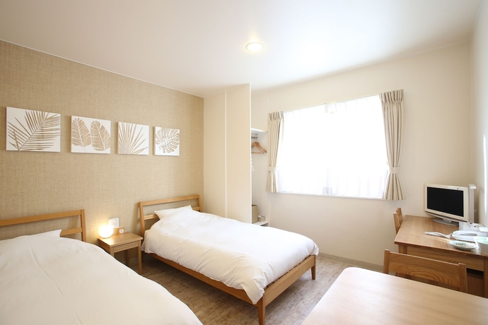 Imagen de la habitación del Hotel Ishigakijima Cucule. Foto 9