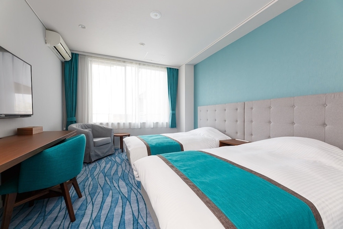 Imagen de la habitación del Hotel Ishinoya Atami. Foto 11