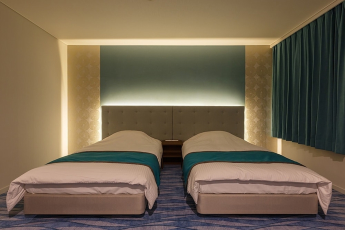 Imagen de la habitación del Hotel Ishinoya Atami. Foto 12