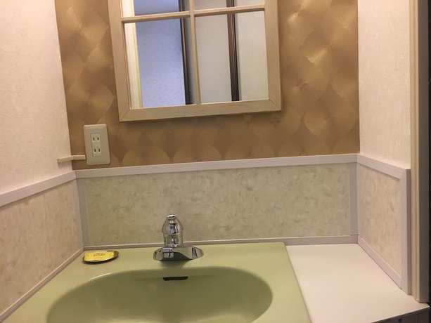 Imagen de la habitación del Hotel Ishiuchi Pension Bruges. Foto 4