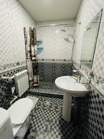 Imagen de la habitación del Hotel Ishonch. Foto 4