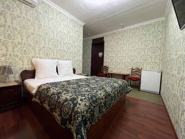 Imagen de la habitación del Hotel Ishonch. Foto 10