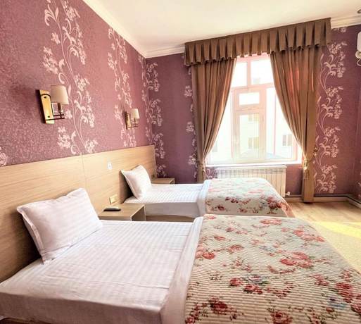 Imagen de la habitación del Hotel Ishonch. Foto 11