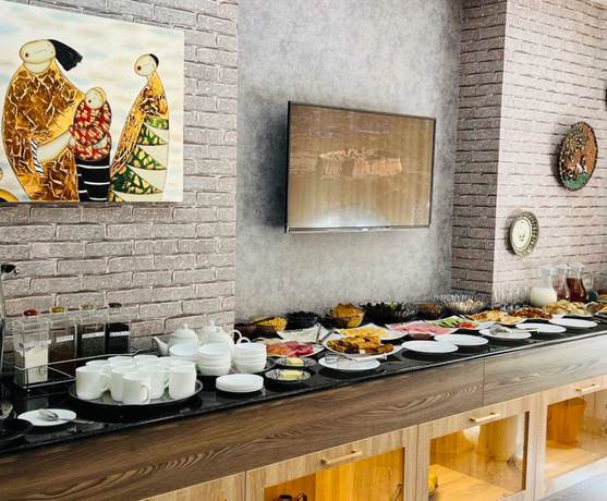 Imagen del bar/restaurante del Hotel Ishonch. Foto 3