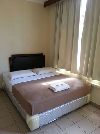 Imagen de la habitación del Hotel Iskandar Sinsuran Guesthouse. Foto 2