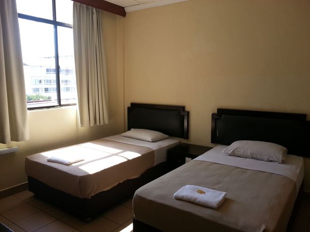 Imagen de la habitación del Hotel Iskandar Sinsuran Guesthouse. Foto 10