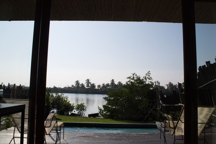 Imagen de la habitación del Hotel Isla Taj&iacute;n Beach and River Resort. Foto 14