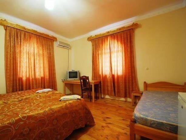 Imagen de la habitación del Hotel Islambek Khiva. Foto 8