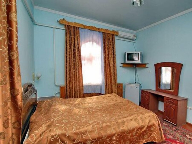 Imagen de la habitación del Hotel Islambek Khiva. Foto 11