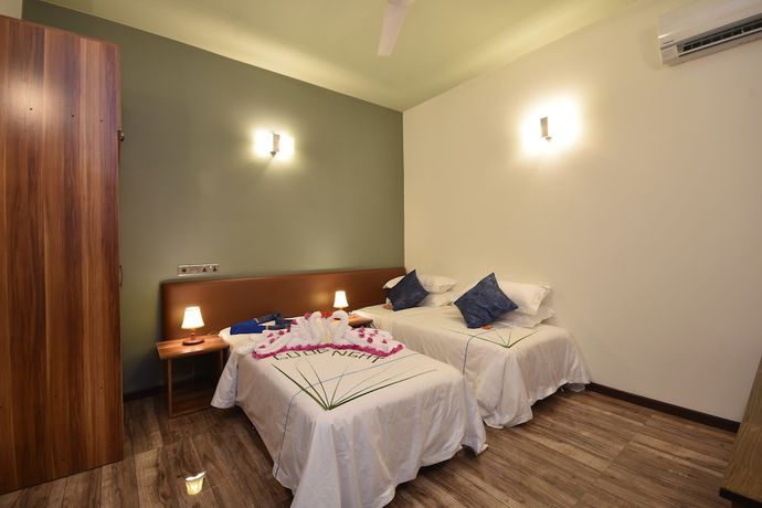 Imagen de la habitación del Hotel Island Home Ukulhas. Foto 7