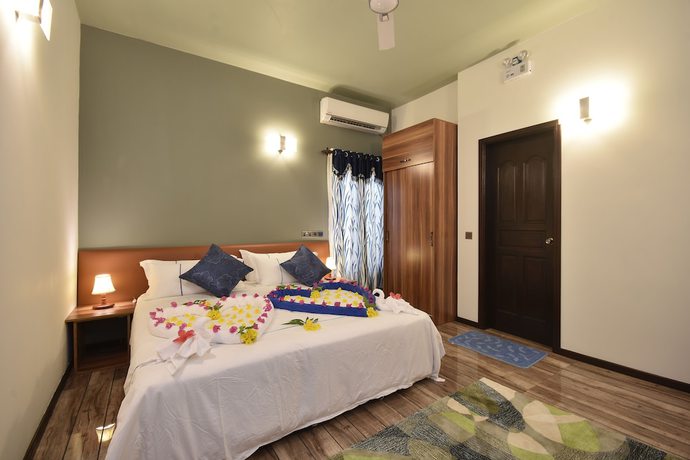 Imagen de la habitación del Hotel Island Home Ukulhas. Foto 11
