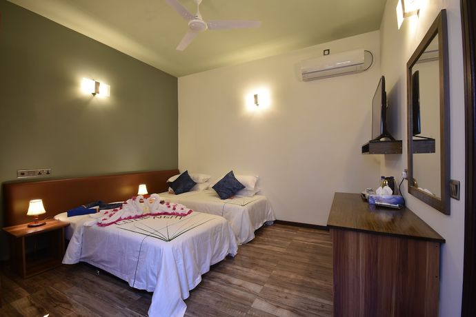 Imagen de la habitación del Hotel Island Home Ukulhas. Foto 13