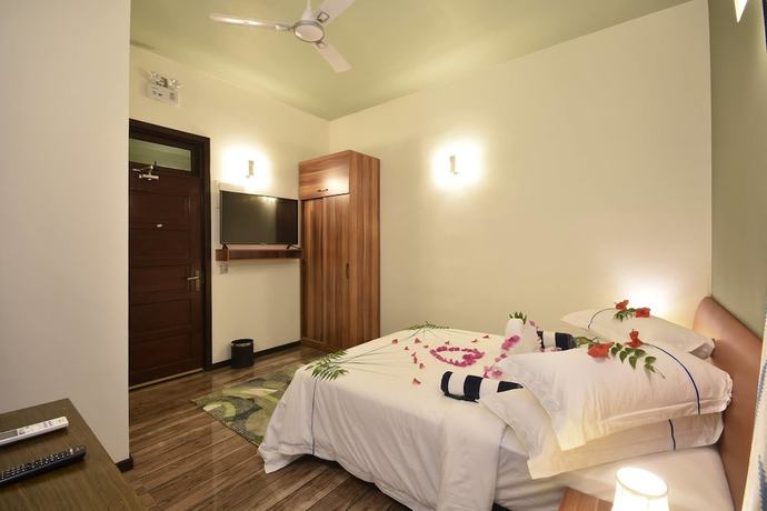 Imagen de la habitación del Hotel Island Home Ukulhas. Foto 14
