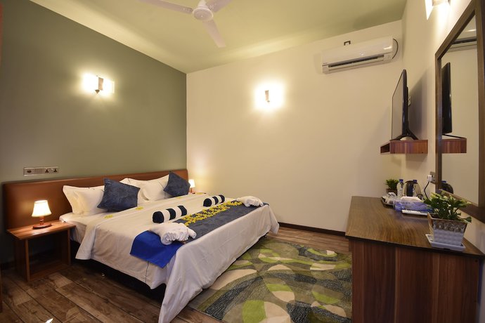 Imagen de la habitación del Hotel Island Home Ukulhas. Foto 19
