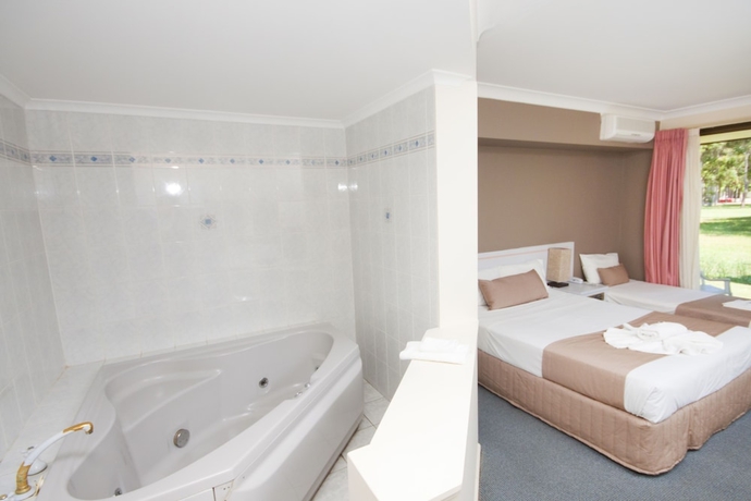 Imagen de la habitación del Hotel Island Palms Motor Inn. Foto 4