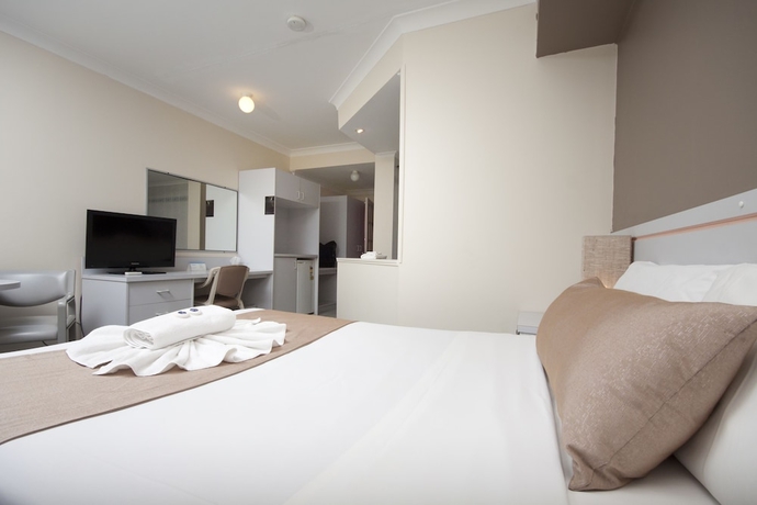 Imagen de la habitación del Hotel Island Palms Motor Inn. Foto 5