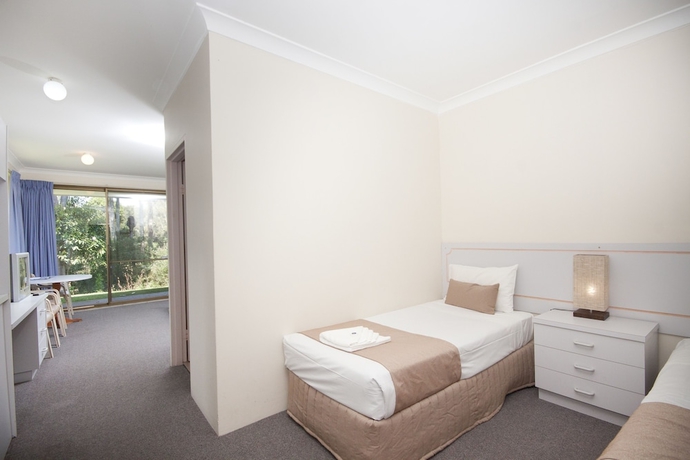 Imagen de la habitación del Hotel Island Palms Motor Inn. Foto 7