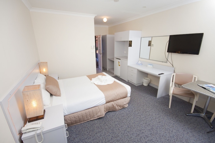 Imagen de la habitación del Hotel Island Palms Motor Inn. Foto 9