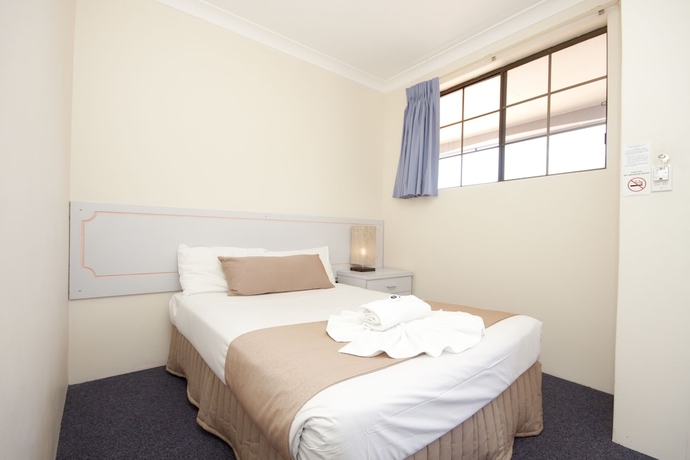 Imagen de la habitación del Hotel Island Palms Motor Inn. Foto 10