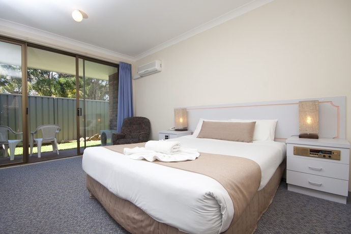 Imagen de la habitación del Hotel Island Palms Motor Inn. Foto 14