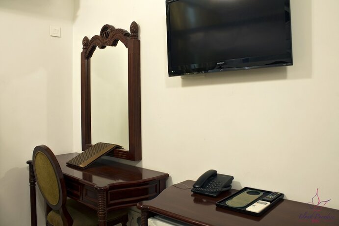 Imagen de la habitación del Hotel Island Paradise Inn. Foto 11